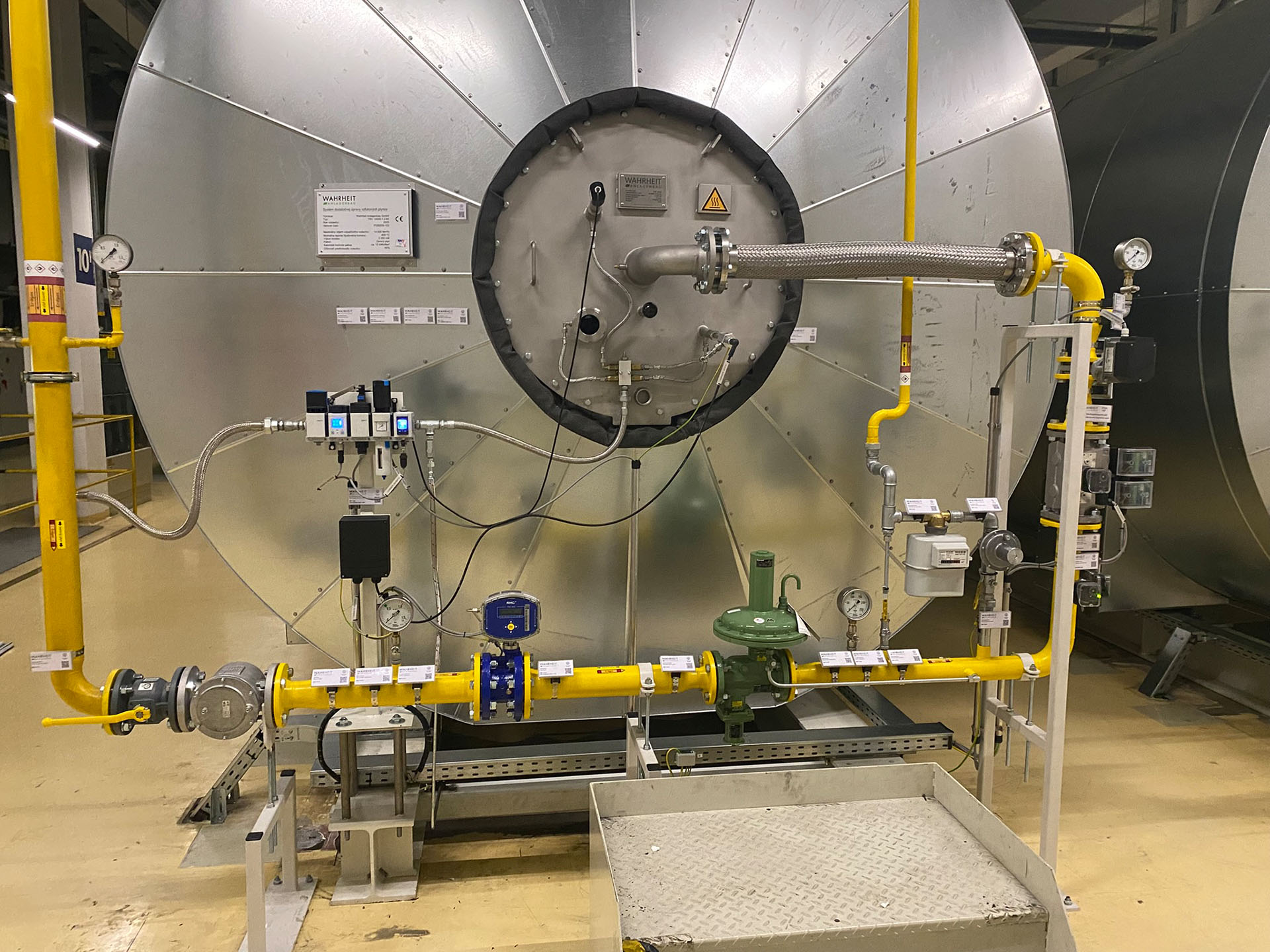 Industrial steam boiler with modern measurement, control and safety systems.