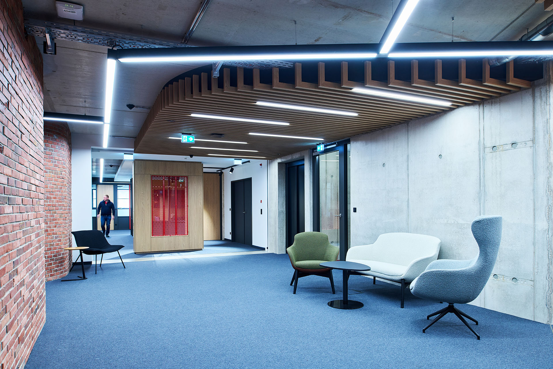 Modern office space featuring premium lighting and open collaboration areas.
