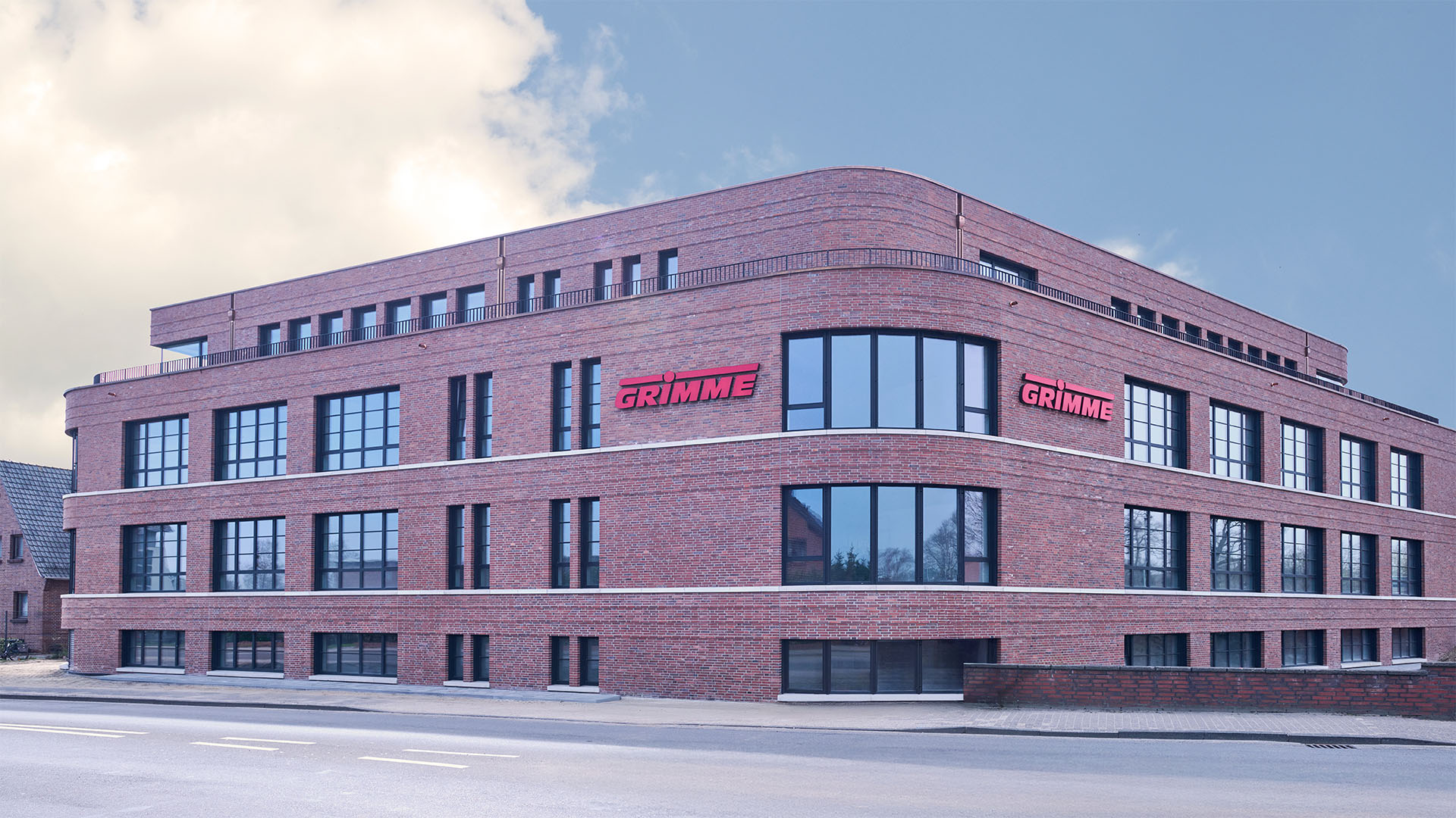 GRIMME headquarters featuring modern architecture and integrated building services.